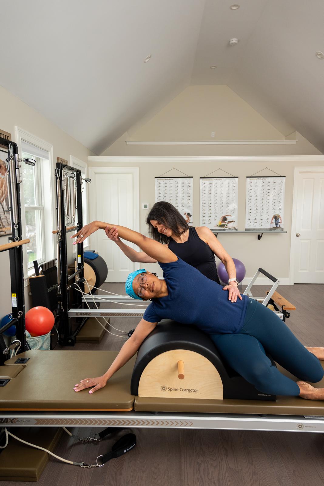 Monica stretching with a client