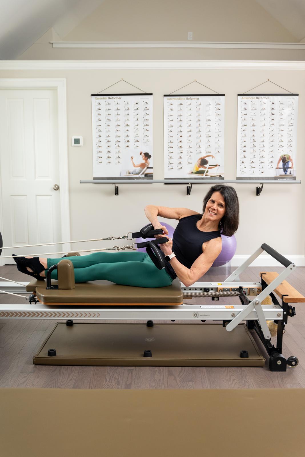 Monica working with the reformer machine